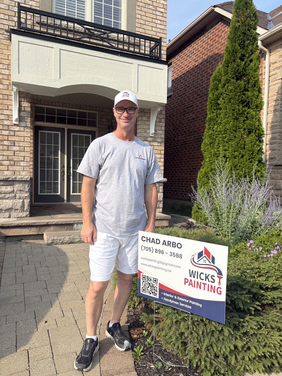 Chad Arbo, owner of Wicks Painting, on a job site